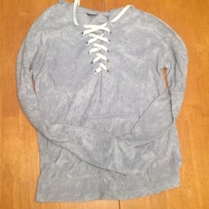 A gray long sleeve shirt.